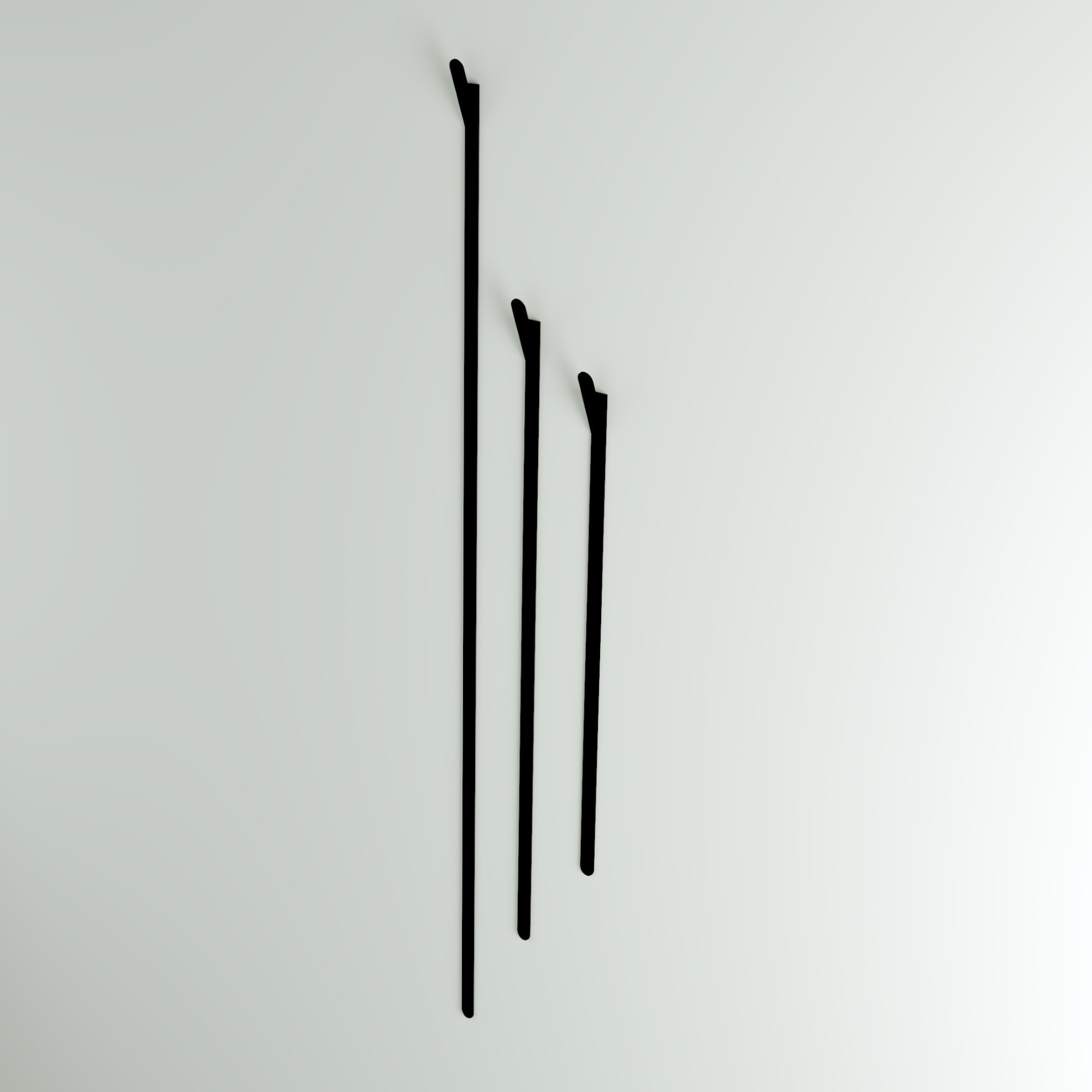Crafted from bent steel with a durable finish, the Slatted Wall Hook adds a striking, minimalist accent while keeping essentials neatly organized.
